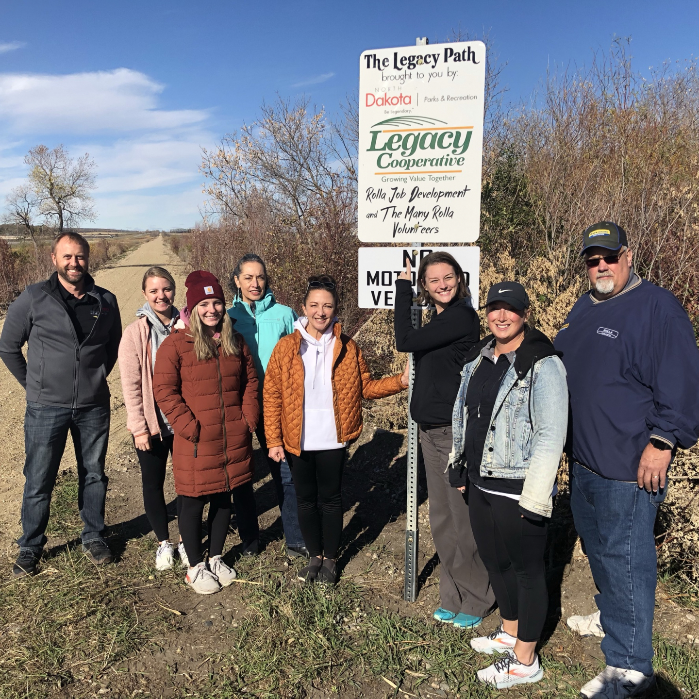 Community members on the path