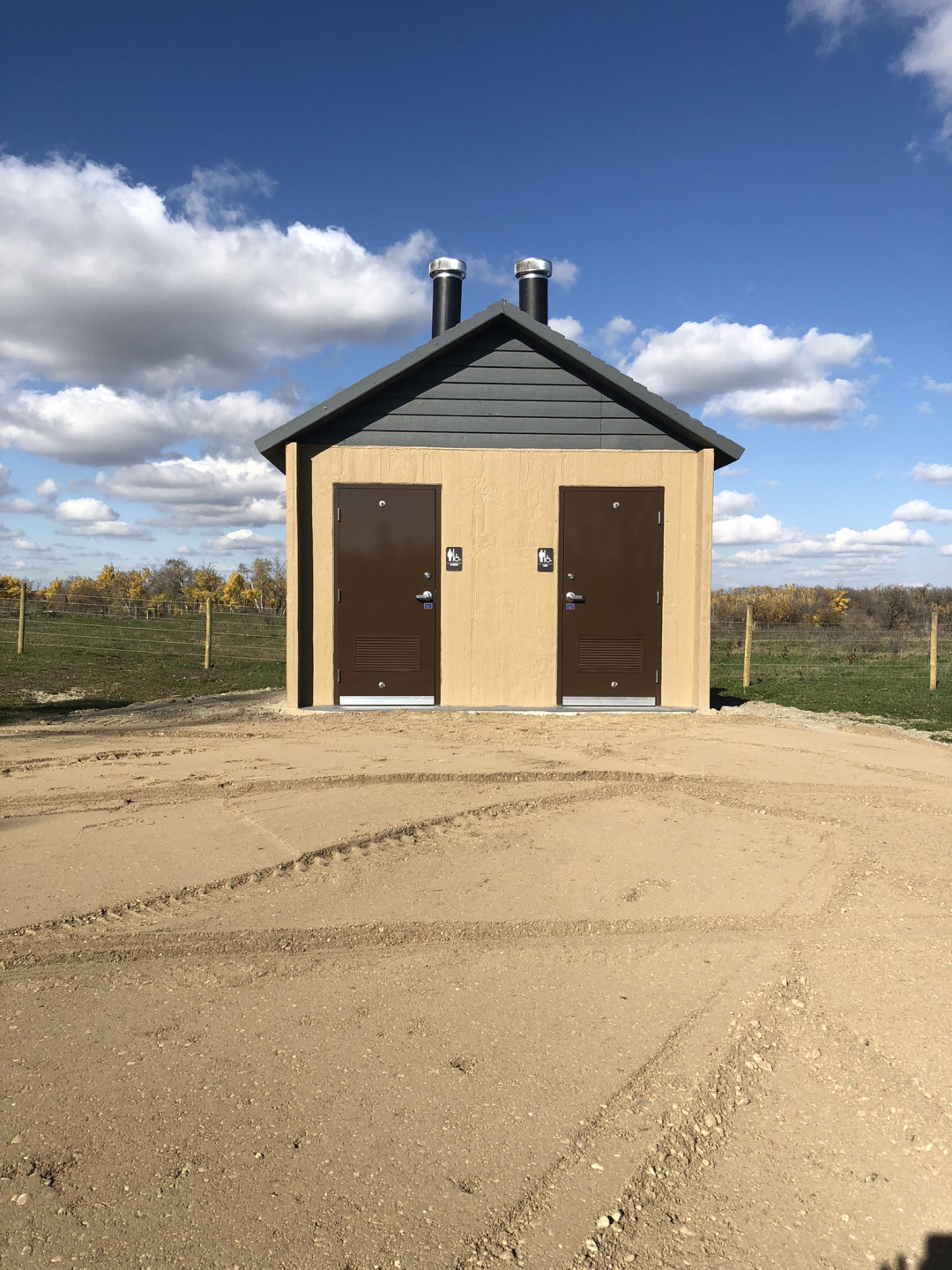 Vault toilet exterior