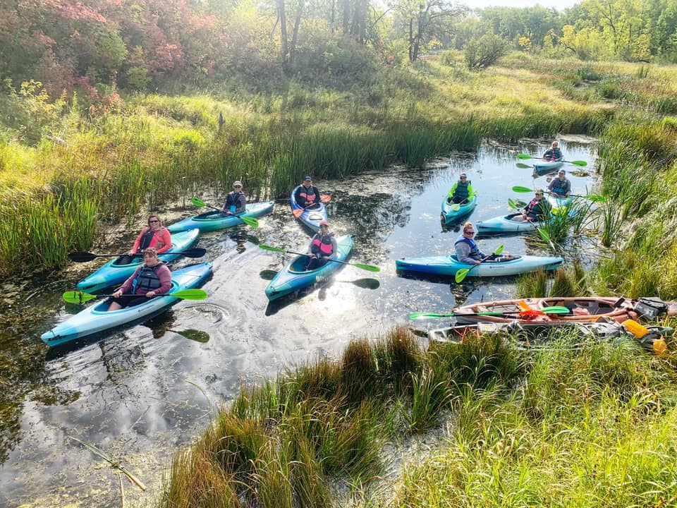 Overhead view of women kayaks on the lake