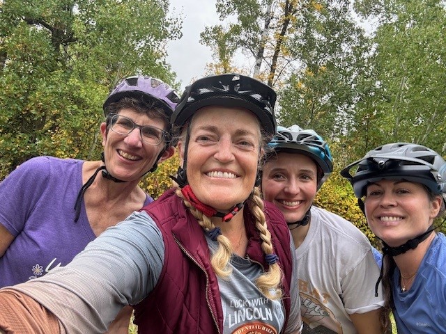 Selfie of women biking together