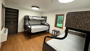 Interior of Basswood Cabin with two bunkbeds.