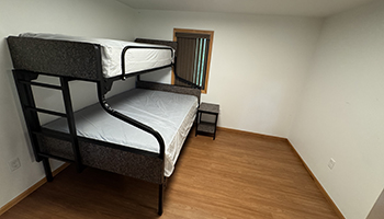 Interior of Elm A cabin with one bunkbed.