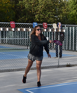 Woman playing pickleball