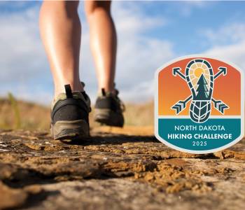 Close up of hiking boots on trail