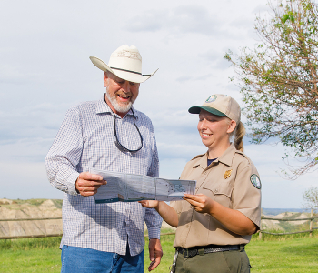 Park ranger assisting visitor